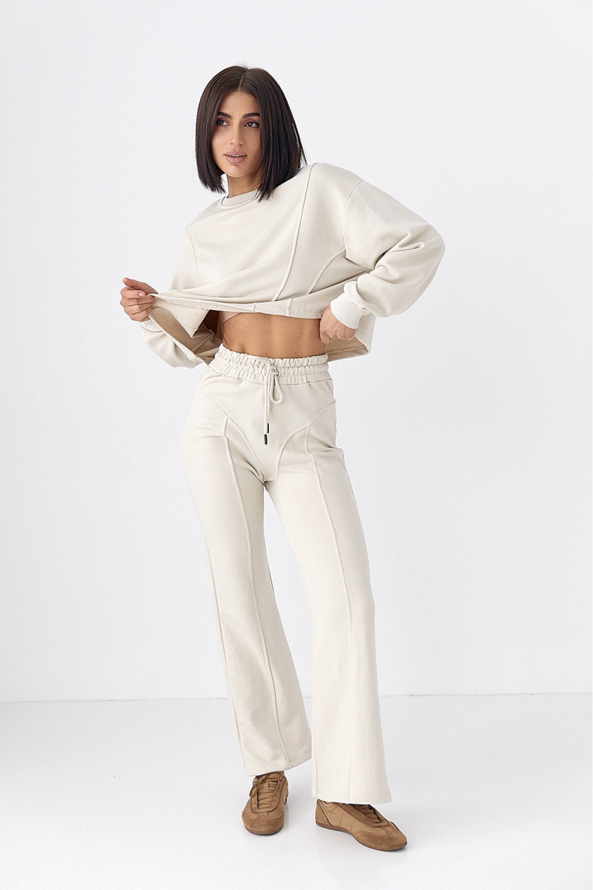 Спортивний костюм жіночий з акцентними швами  бежевий колір