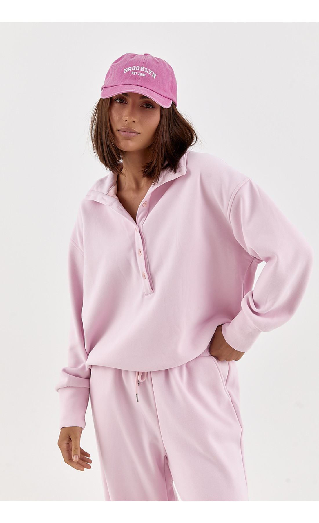 Спортивний костюм вільного крою зі світшотомполо  рожевий колір