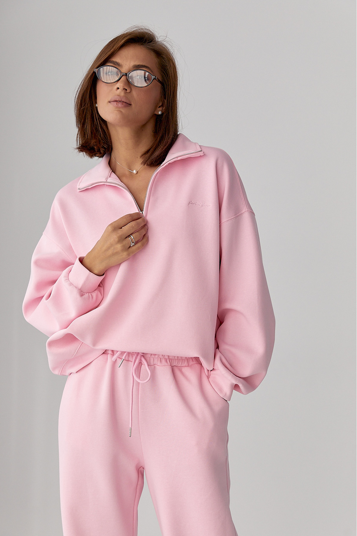 Однотонний спортивний костюм із написом  рожевий колір