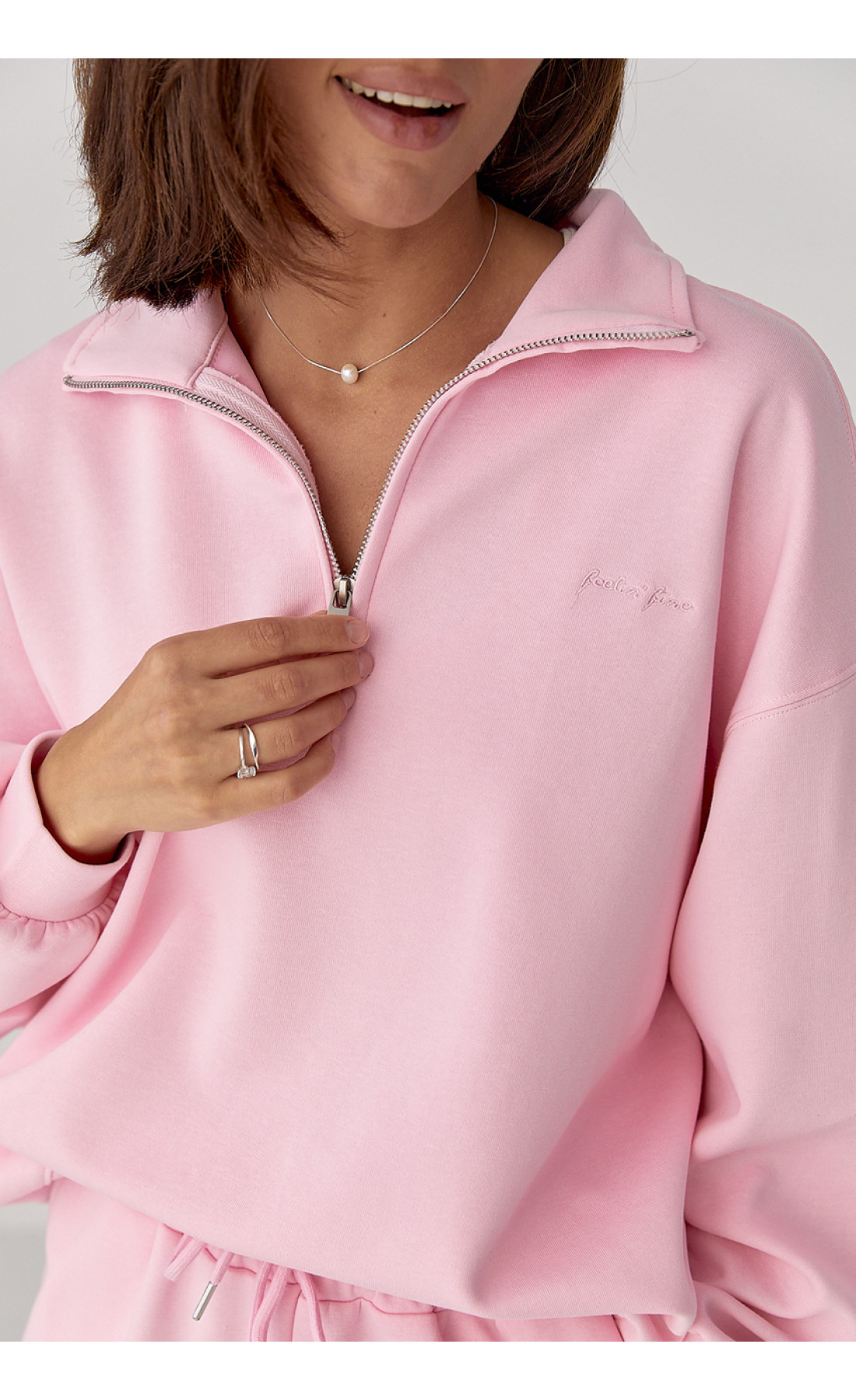 Однотонний спортивний костюм із написом  рожевий колір