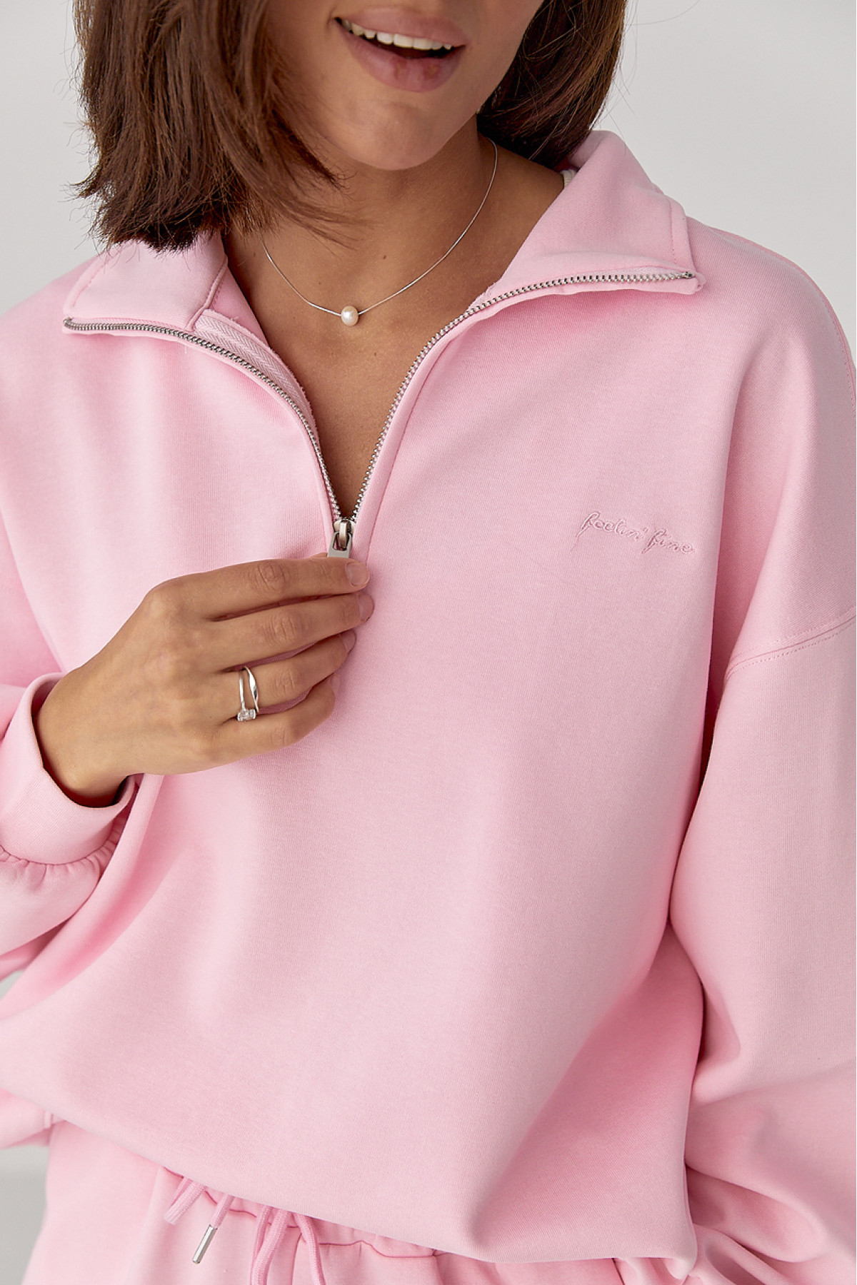 Однотонний спортивний костюм із написом  рожевий колір