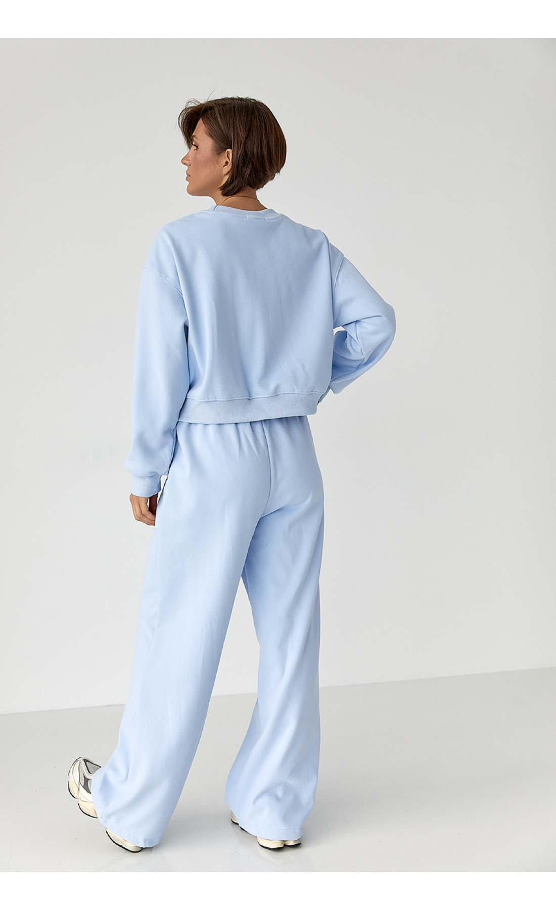 Спортивний костюм із плюшевим начосом з коротким світшотом та штанами палаццо  блакитний колір