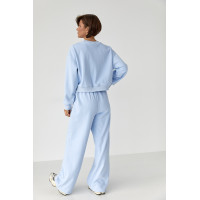 Спортивний костюм із плюшевим начосом з коротким світшотом та штанами палаццо  блакитний колір
