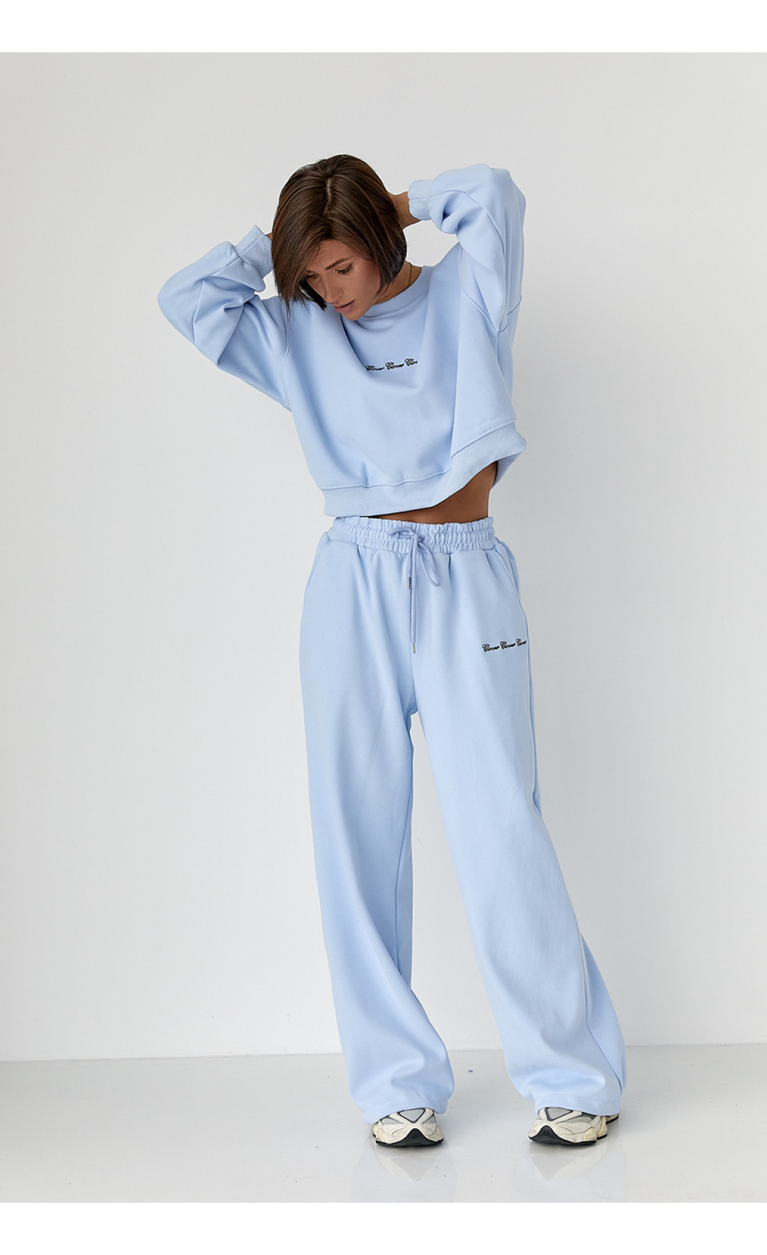 Спортивний костюм із плюшевим начосом з коротким світшотом та штанами палаццо  блакитний колір