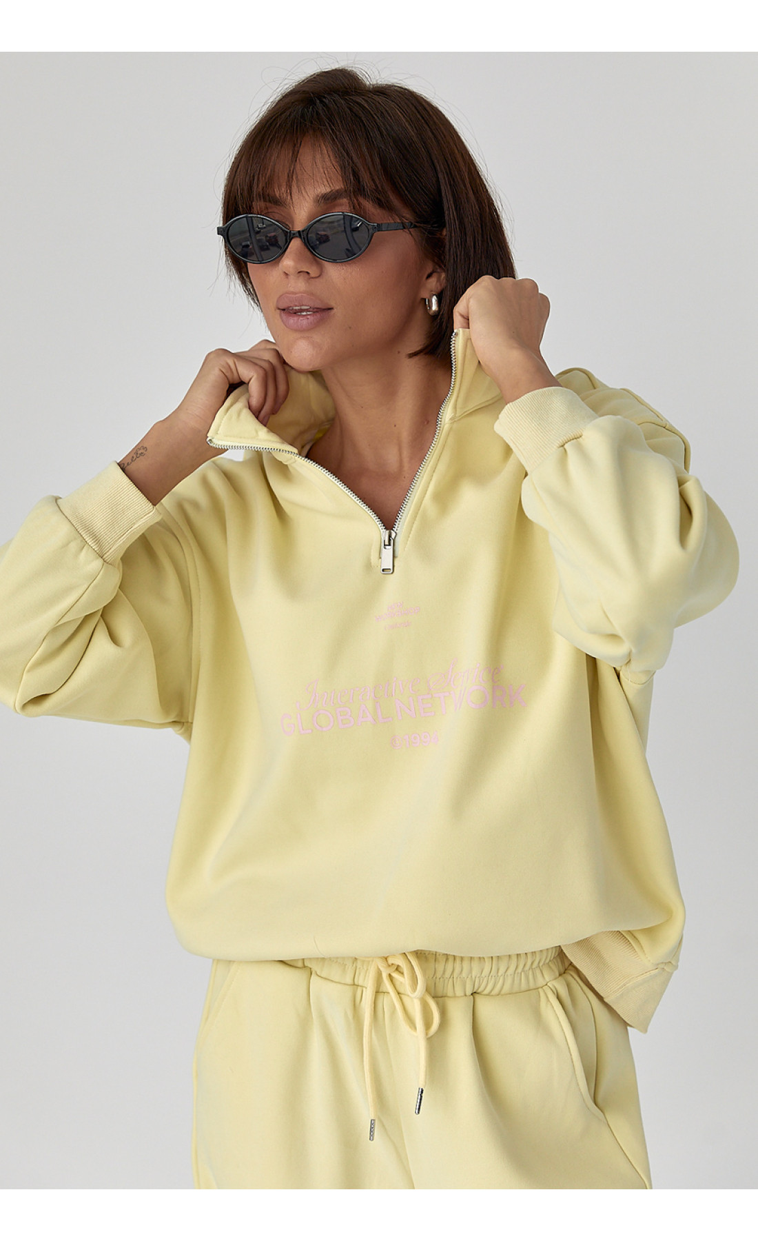 Теплий спортивний костюм з написами  лимонний колір