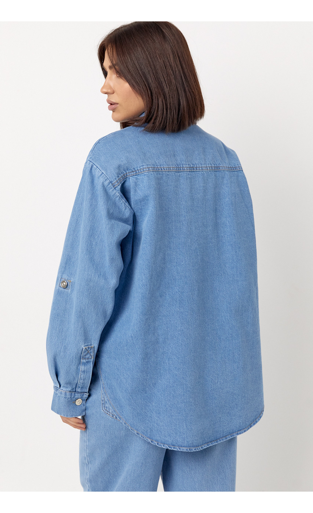 Жіноча джинсова сорочка на ґудзиках  блакитний колір