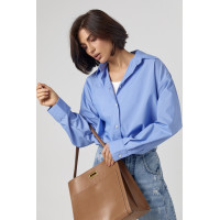 Класична однотонна жіноча сорочка з напівкруглим низом  блакитний колір