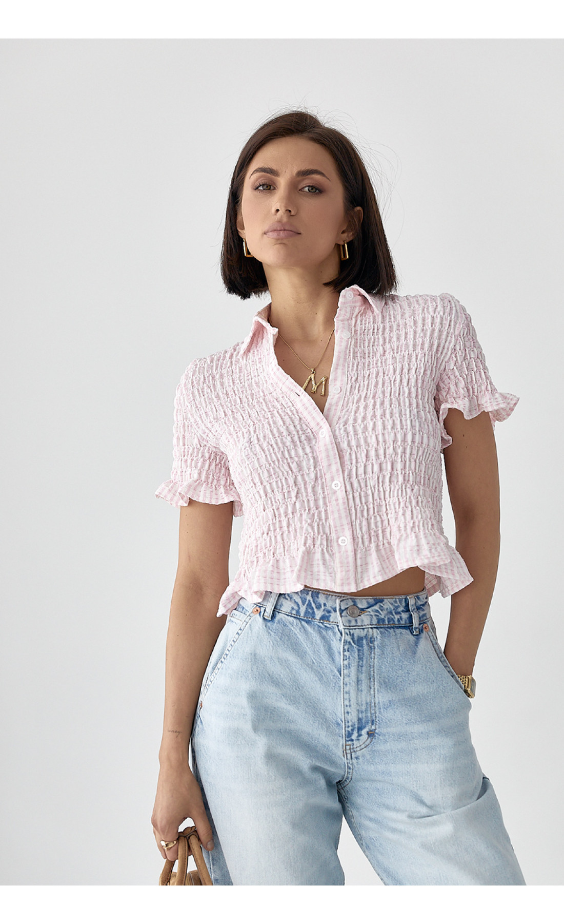 Смугаста блуза з ефектом жатки  рожевий колір