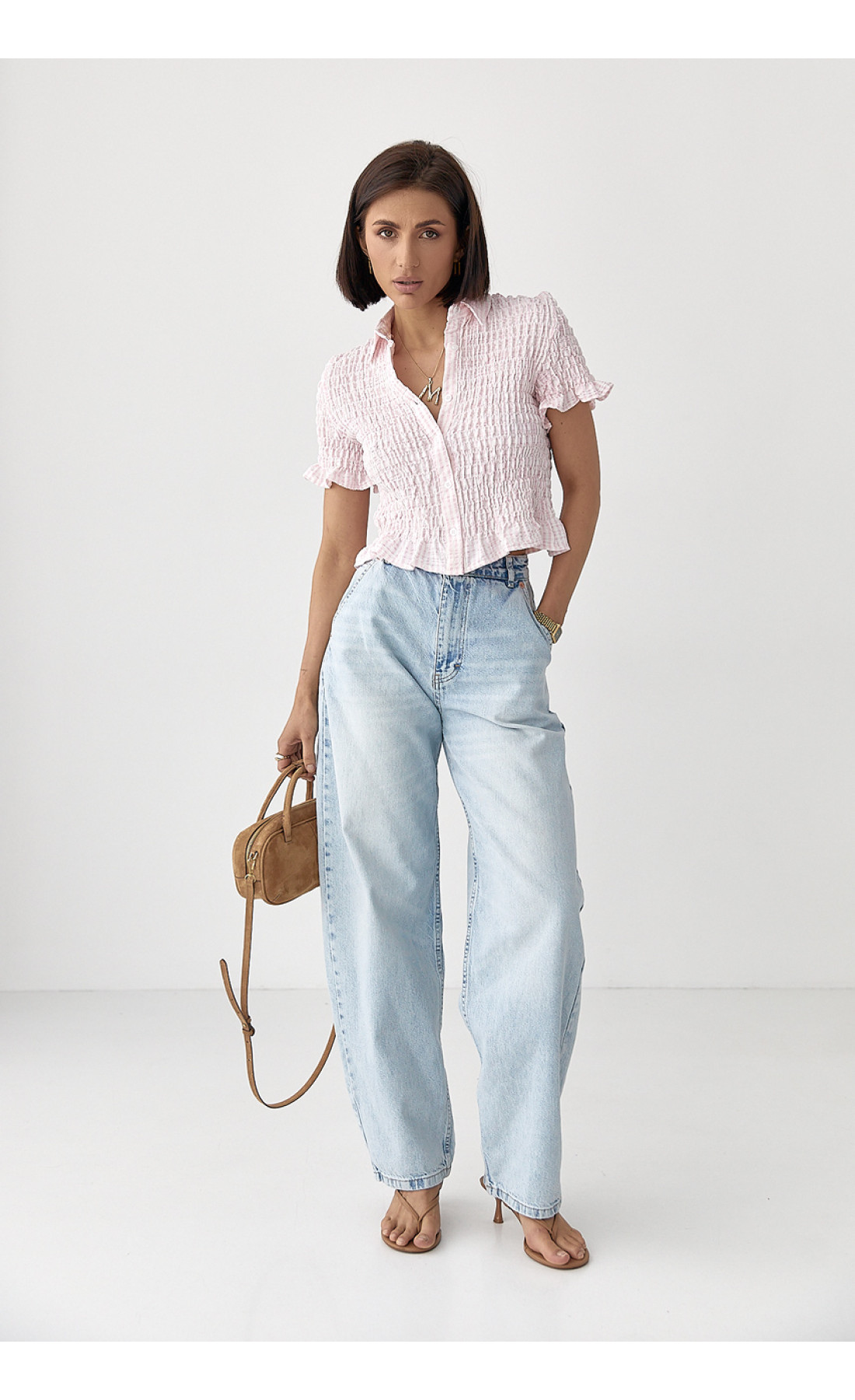 Смугаста блуза з ефектом жатки  рожевий колір