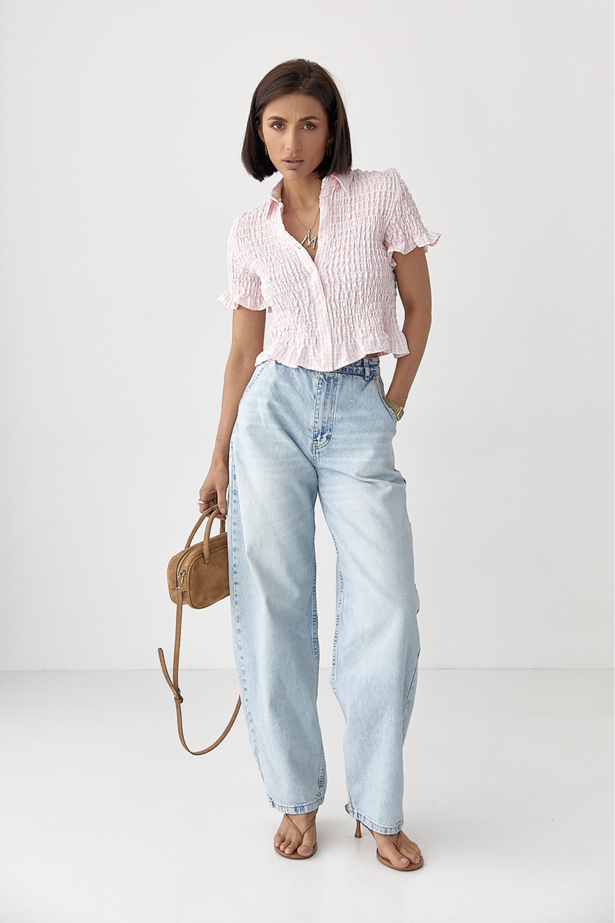 Смугаста блуза з ефектом жатки  рожевий колір