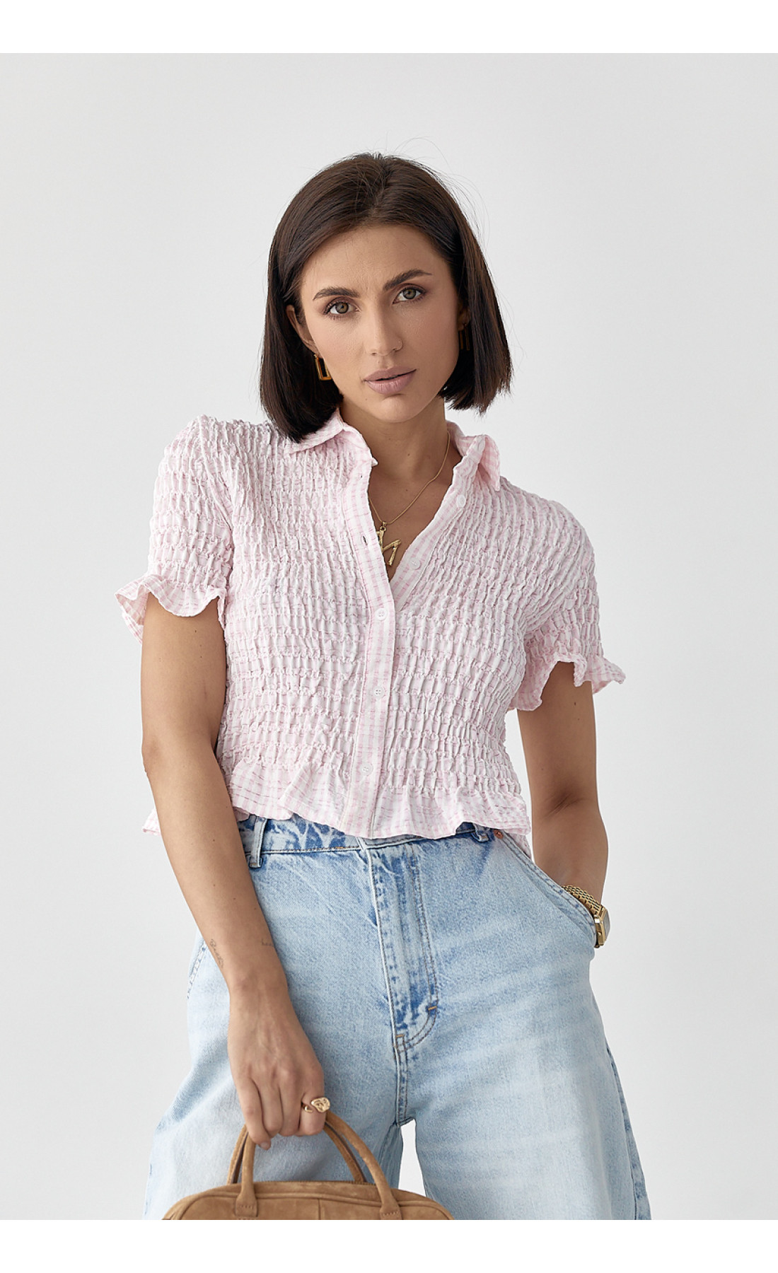 Смугаста блуза з ефектом жатки  рожевий колір