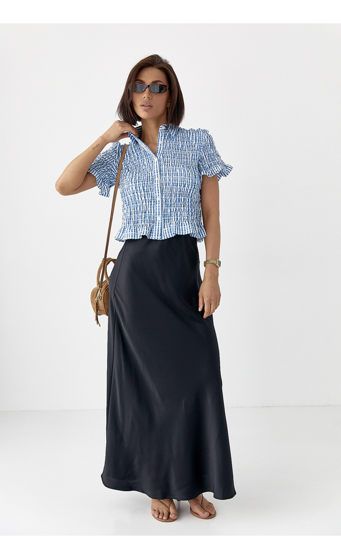 Смугаста блуза з ефектом жатки  синій колір