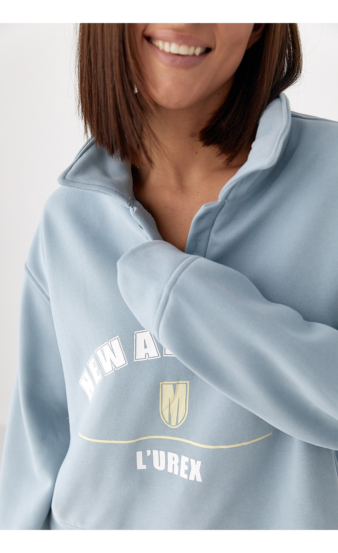 Утеплений світшотполо з ґудзиками  блакитний колір