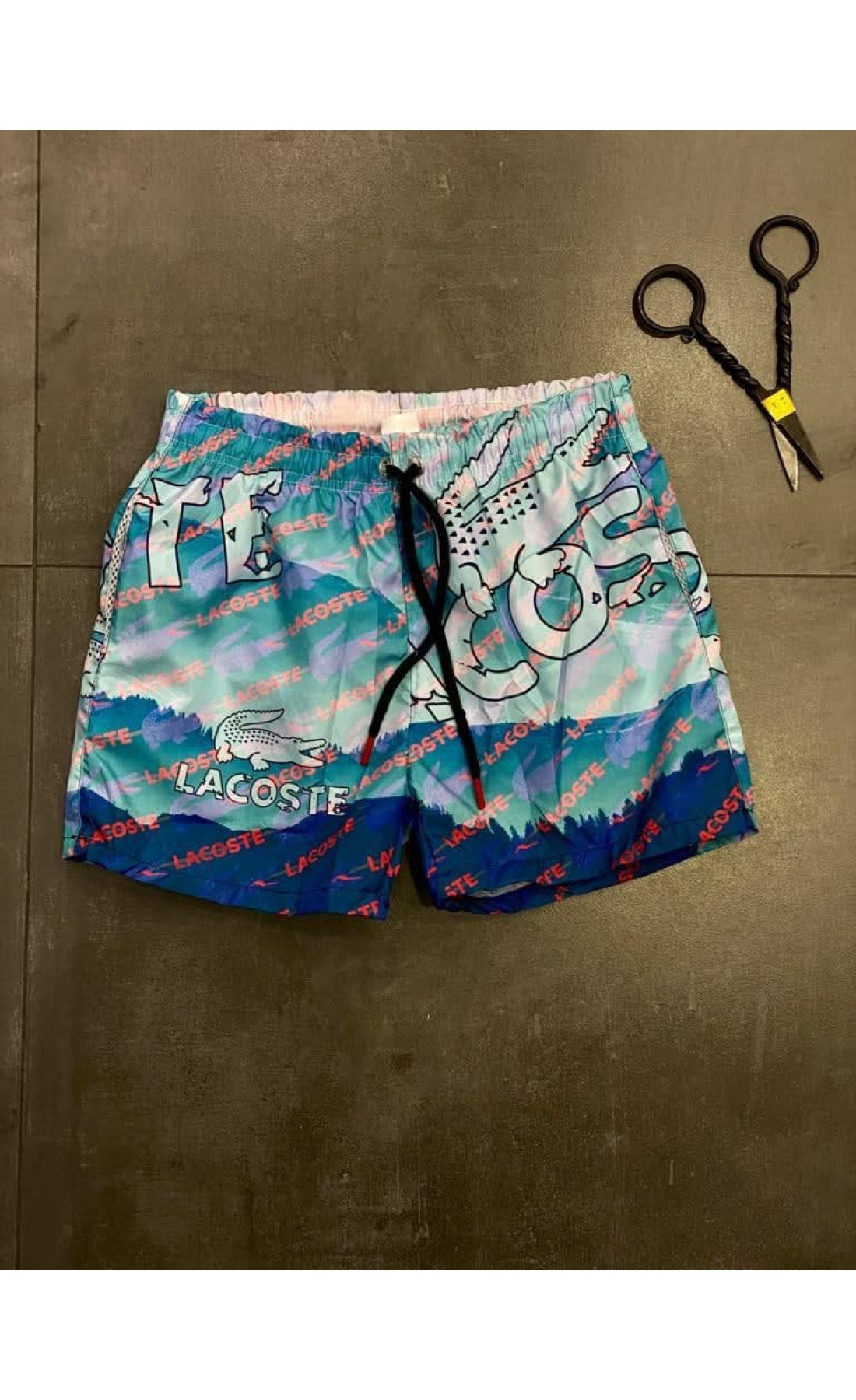 Блакитні чоловічі пляжні шорти