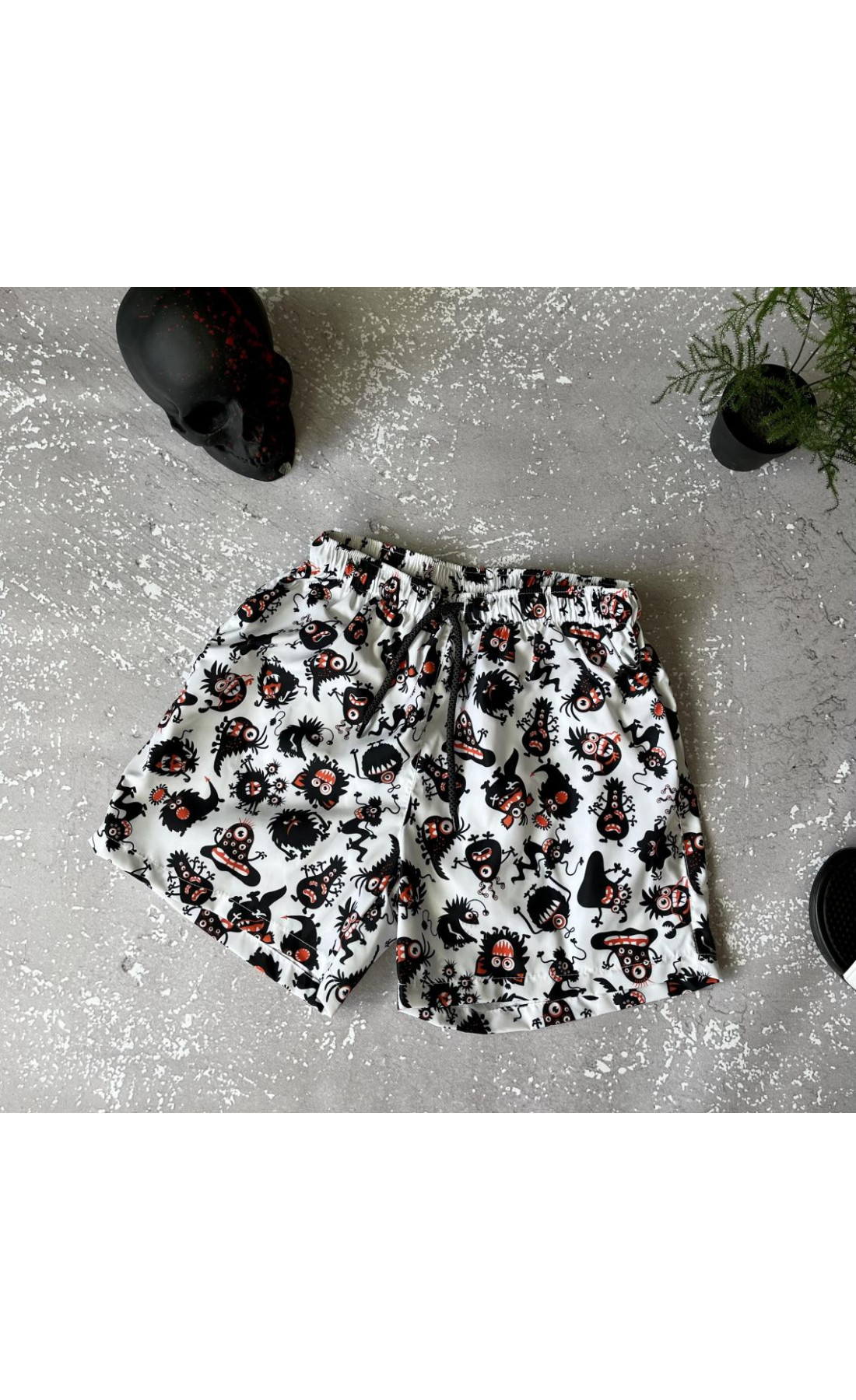 білі чоловічі плажні шорти на підкладці з модним принтом