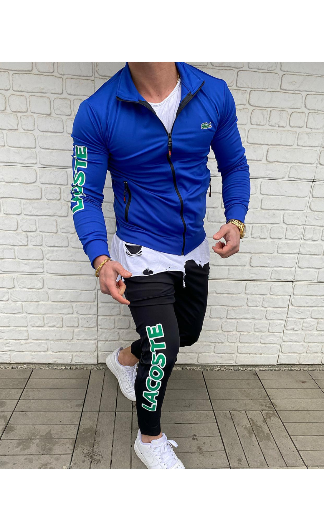 Яскравий спортивний костюм lacoste