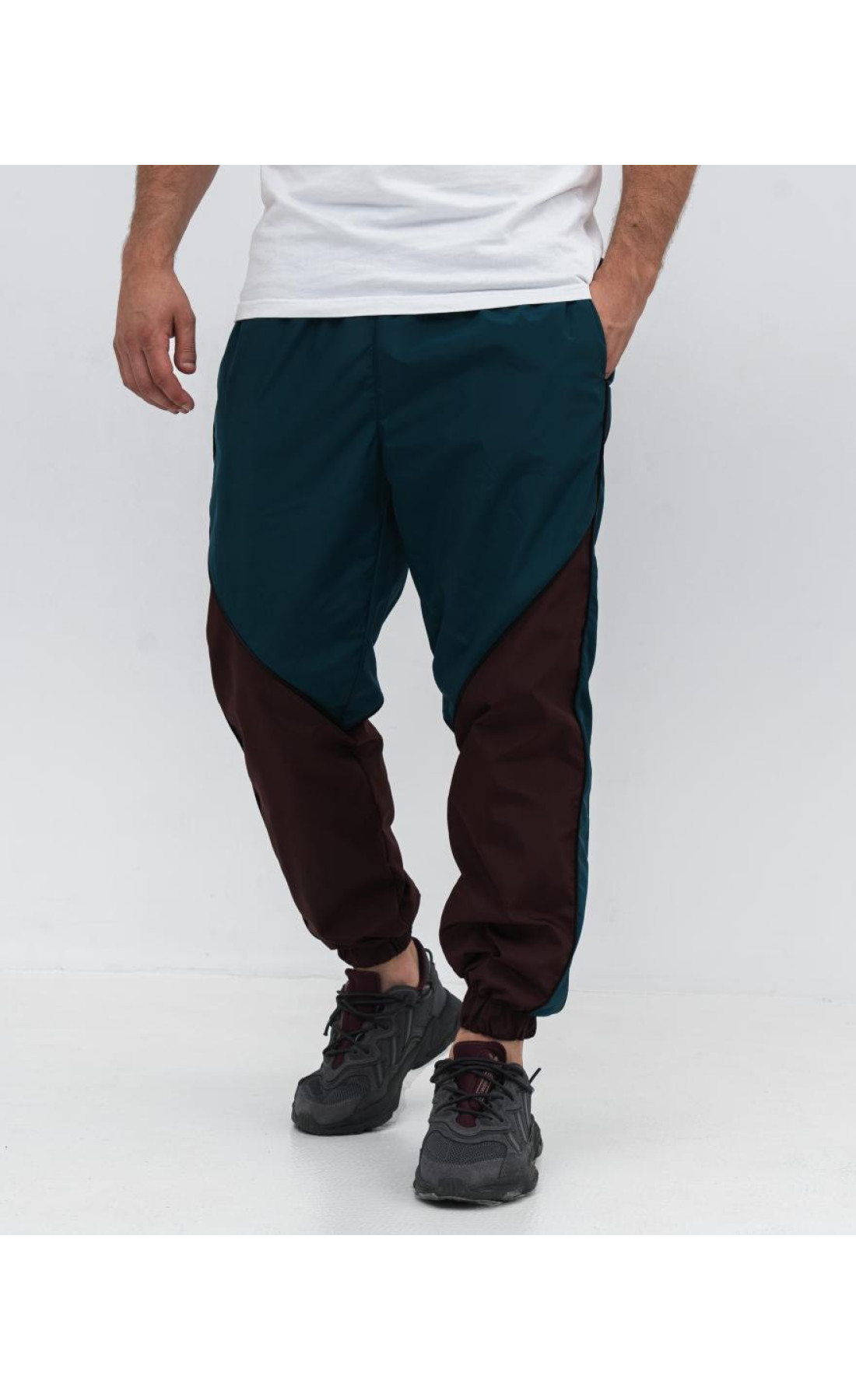 Спортивні штани чоловічі плащівка на манжетах